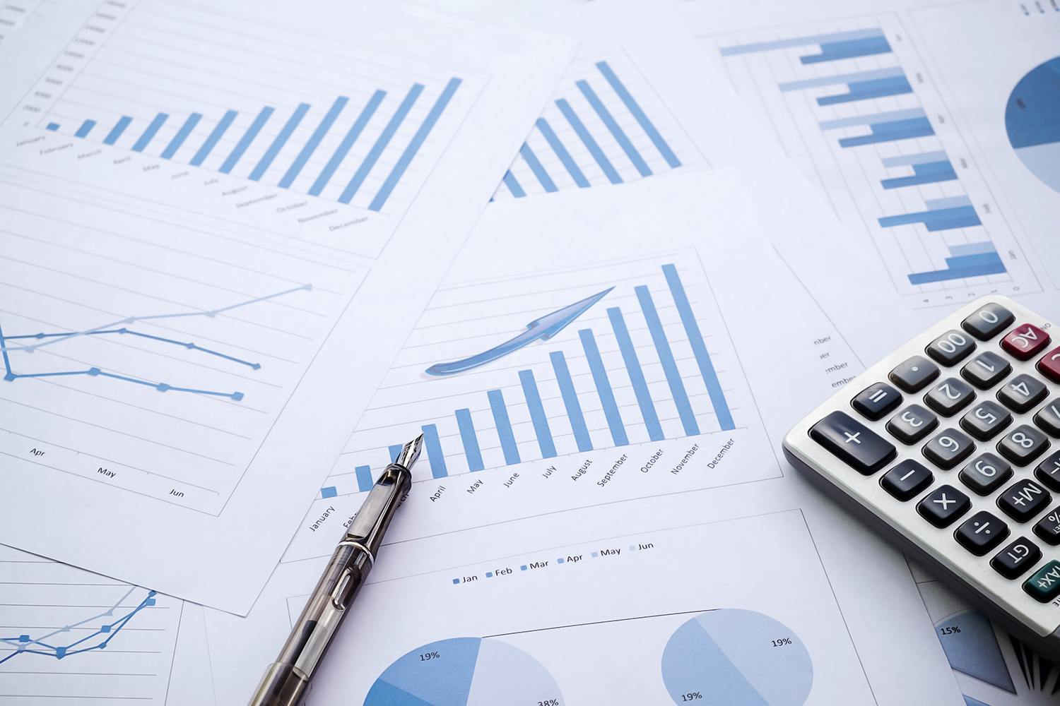 Desk office with pen, analysis report ,calculator. view from top. concept of business analysis, data analysis.