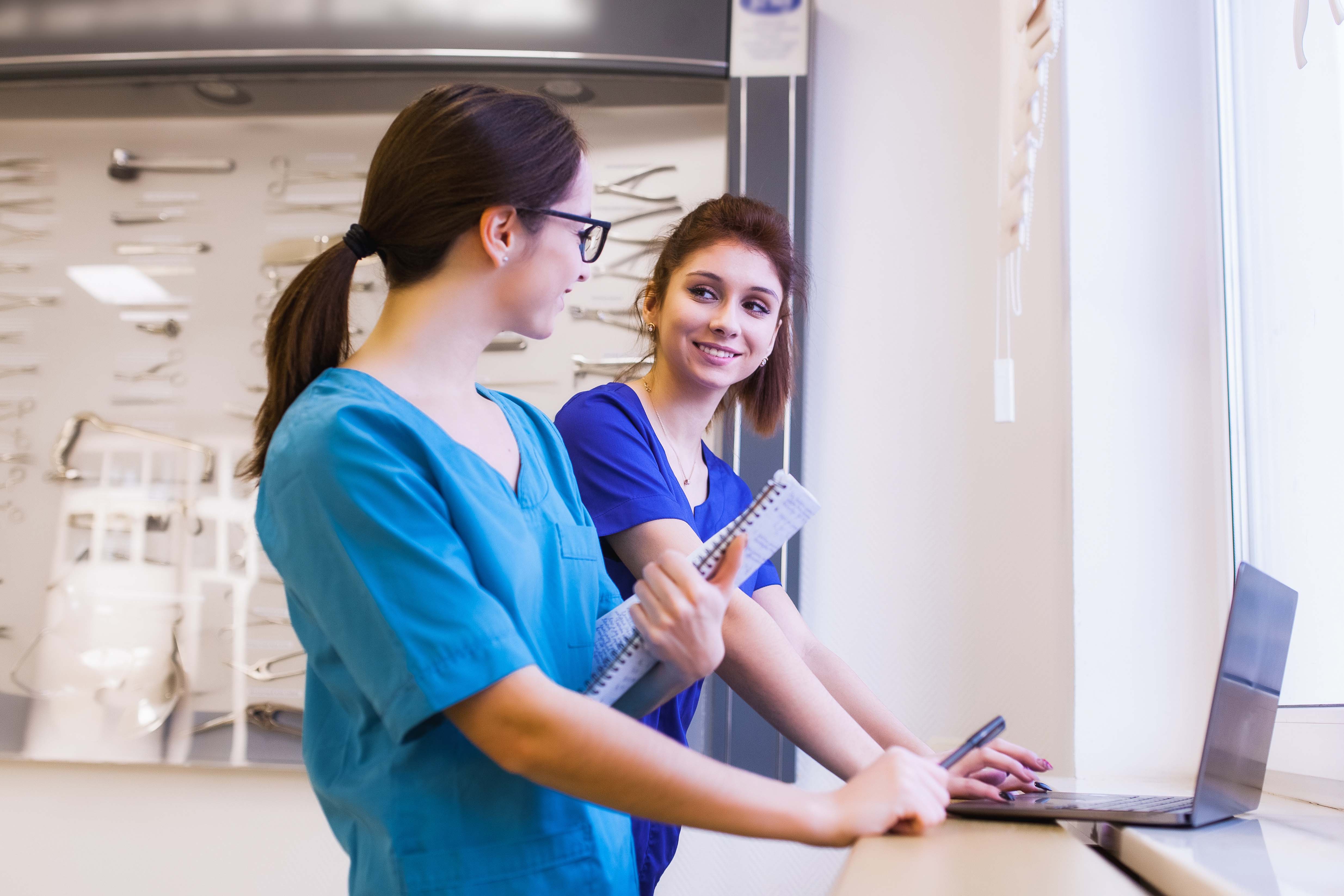 two girls nurses are studying surgical instruments. Medical education